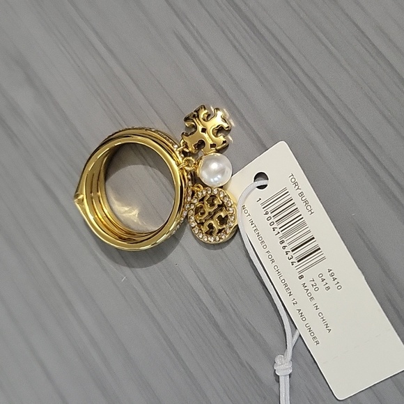 Tory Burch Elegant Gold-Tone Charm Ring Set - Picture 2 of 2
